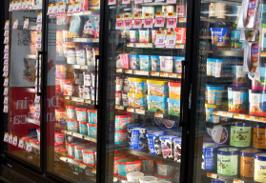 Freezer doors stocked with pints and tubs of ice cream