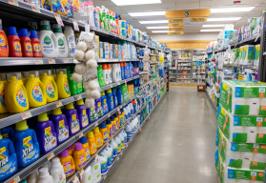 A grocery aisle stocked with cleaning and laundry supplies